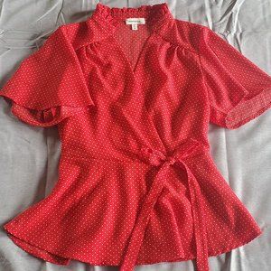Red polka dot flutter sleeved top